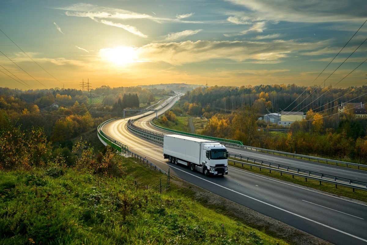 Truck on highway EU CBAM regulations will require payments for EU imports for carbon-producing goods